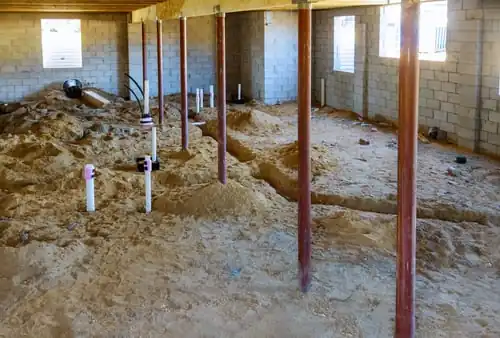 Underground service lines laid and stubbed up before backfill